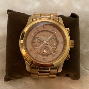 Michael Kors Rose Gold unisex watch. With original box.